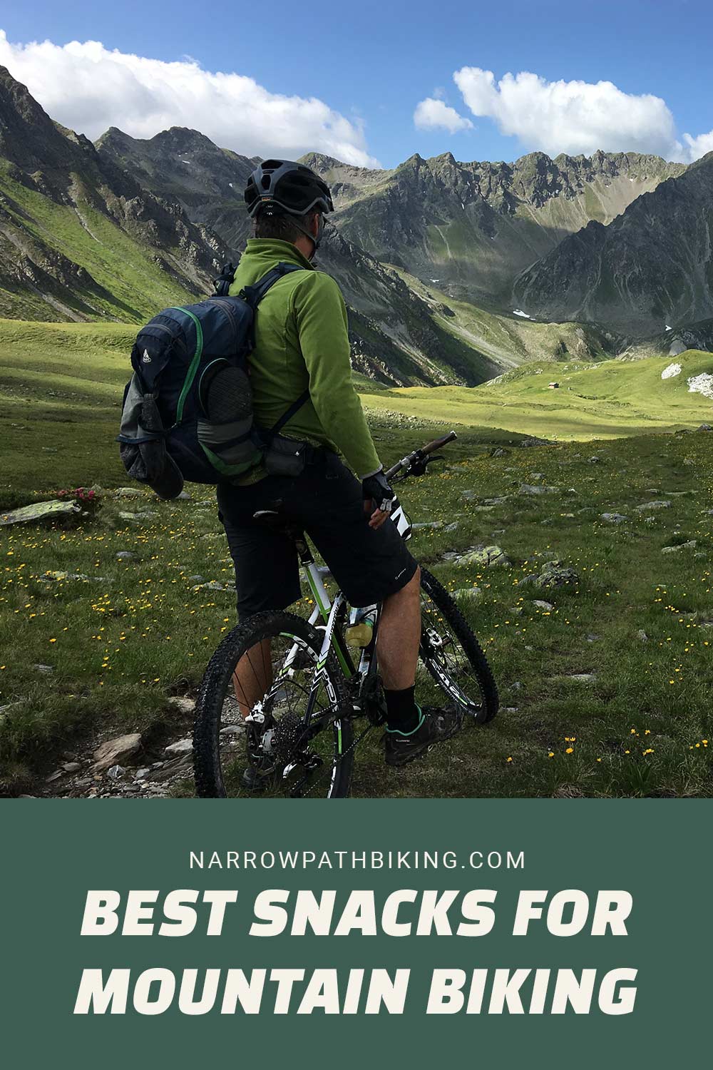 Man in a green jacket on a MTB with a backpack - Best Snacks for Mountain Biking