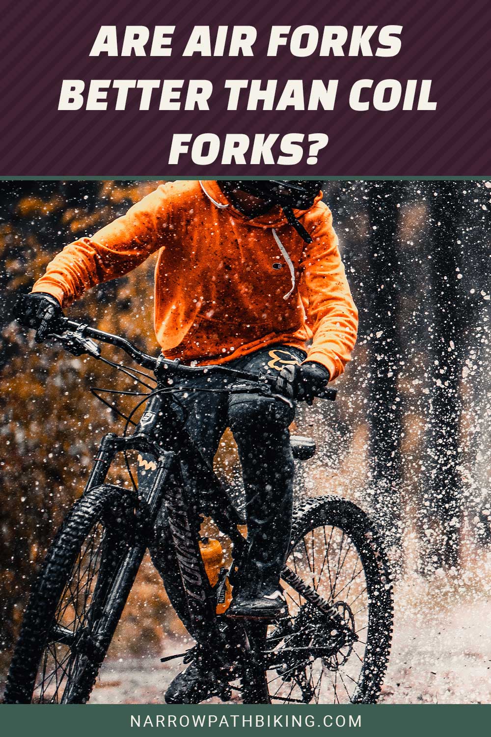 Person in orange hoodie on an MTB - Are Air Forks Better Than Coil Forks?