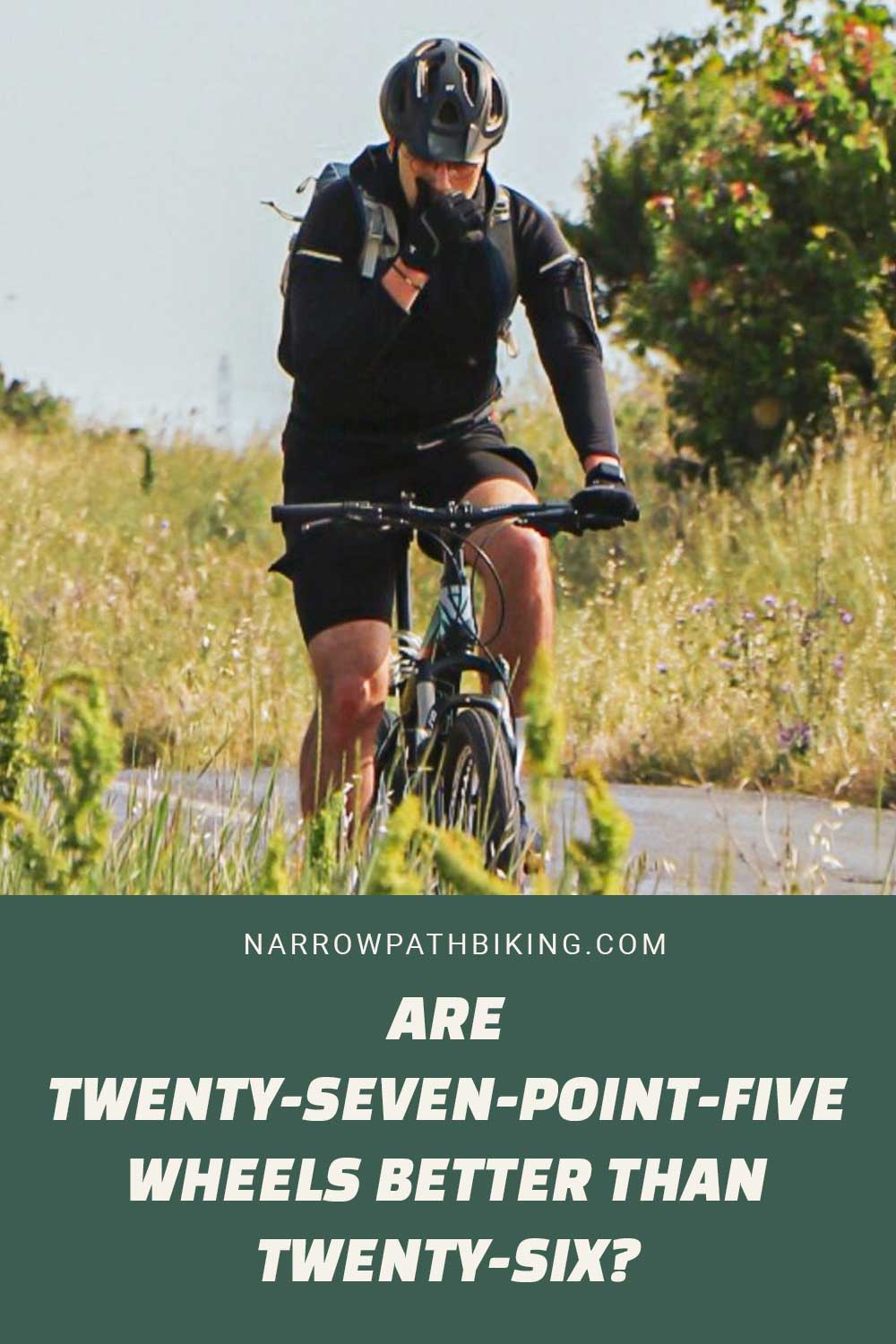 Man in black jacket and shorts on a bike - Are Twenty-Seven-Point-Five Wheels Better Than Twenty-Six?
